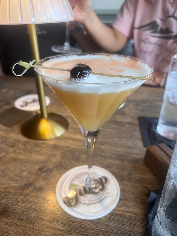 Julep Houston Cocktail Bar Review: Bold Cocktails & Cozy Vibe